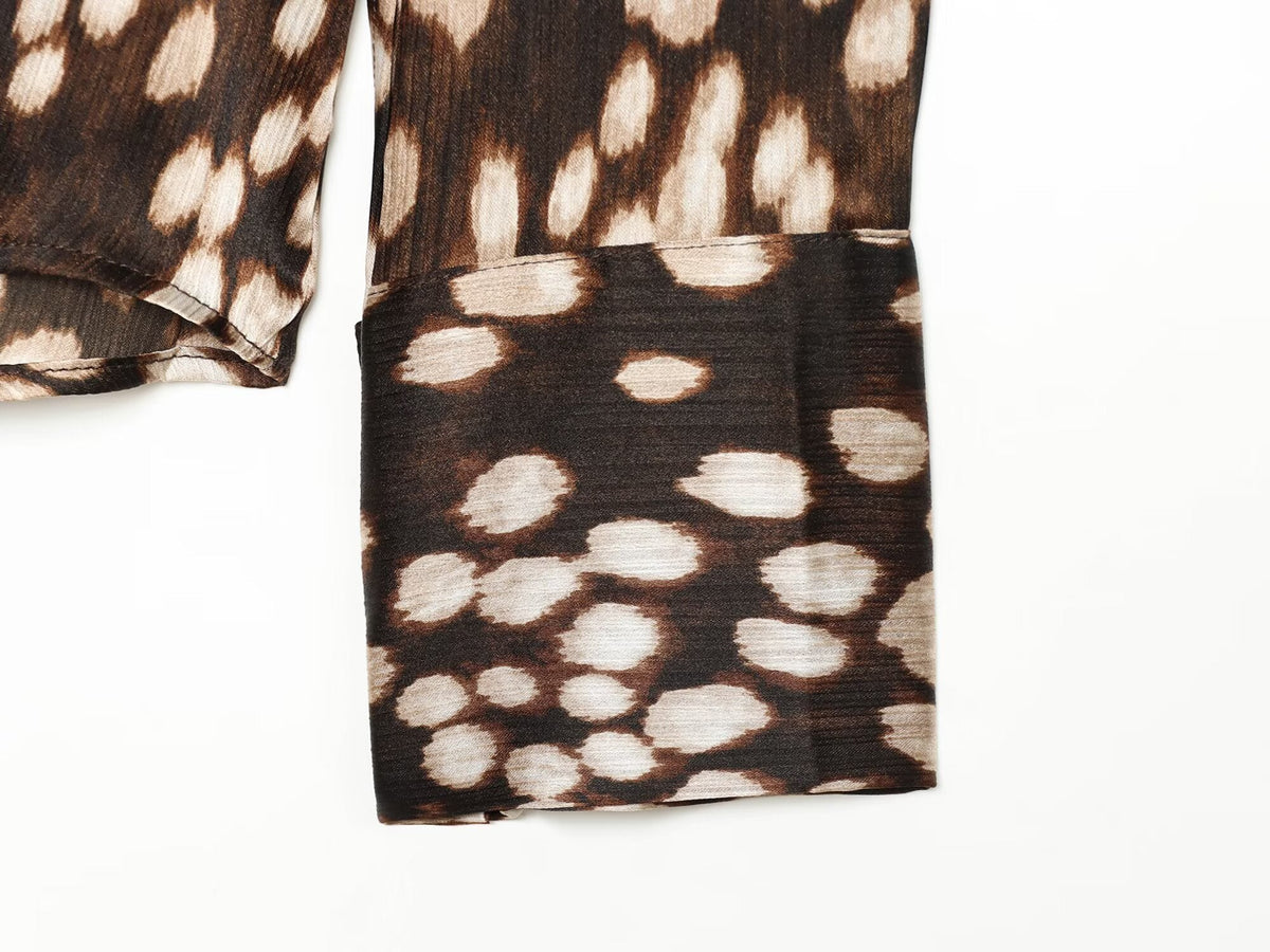 Women's spotted print lapel button top