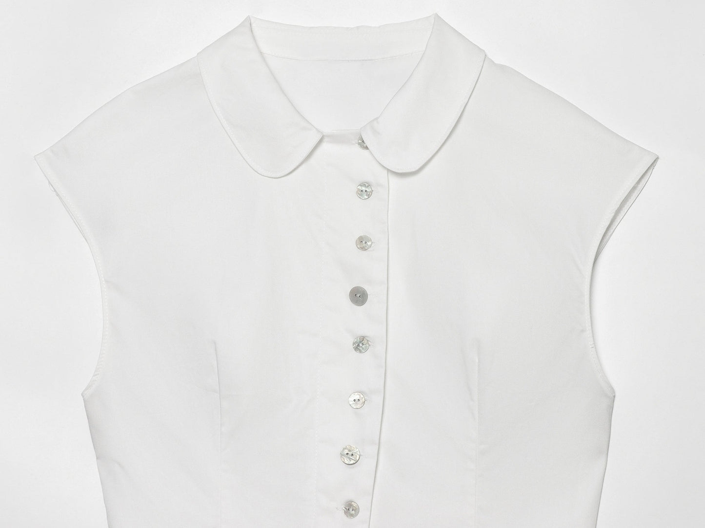 Women's breasted decorative sleeveless lapel top