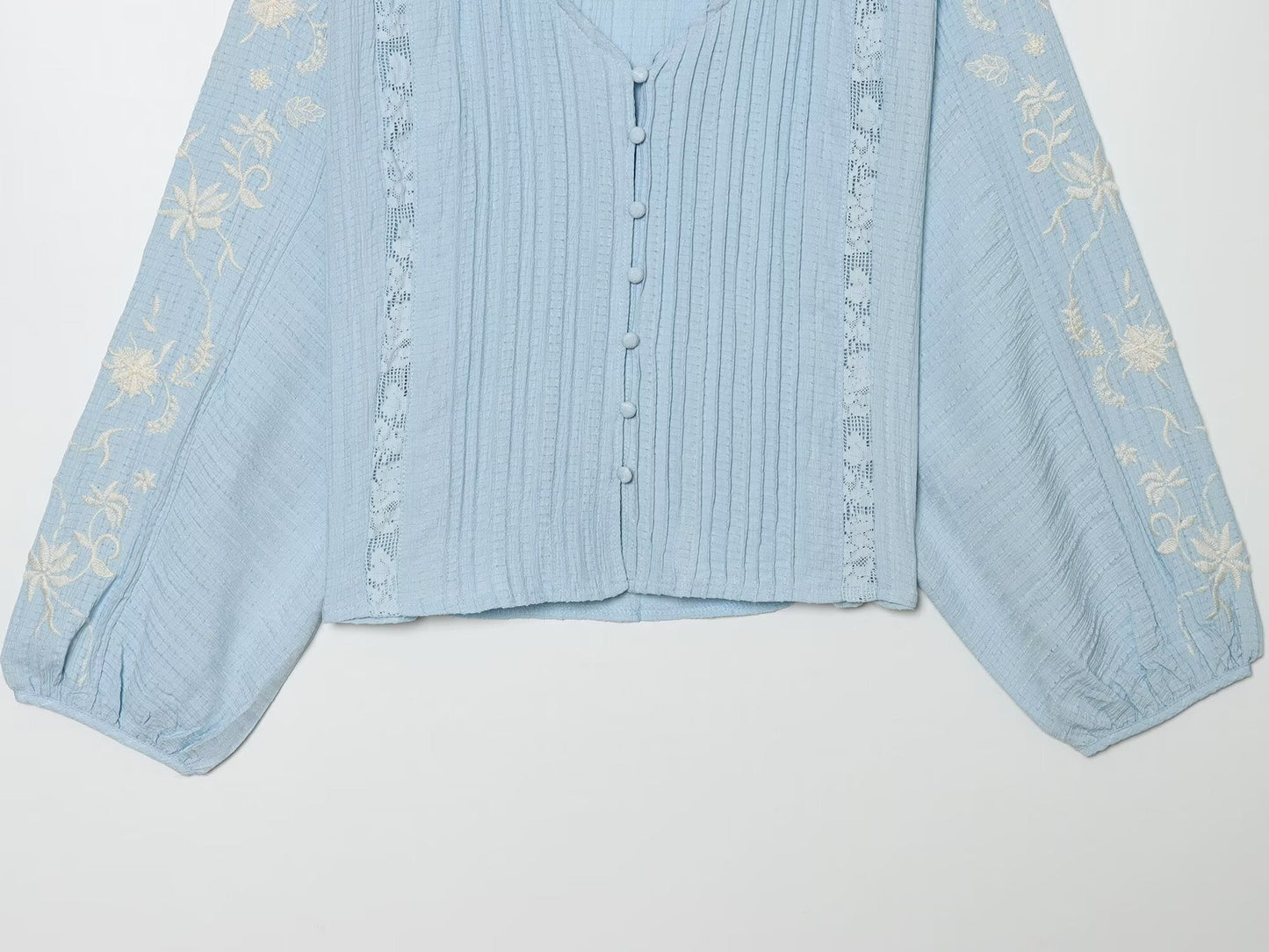 Women's contrasting embroidered V-neck shirt