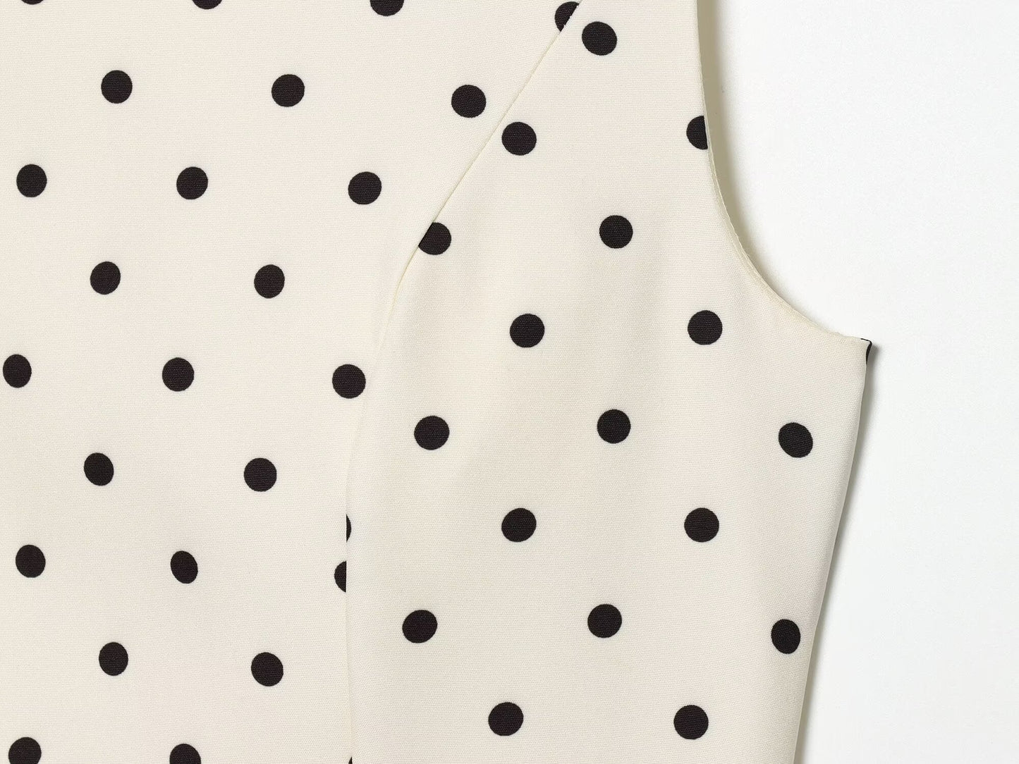 Women's ruffled hem polka dot sleeveless top